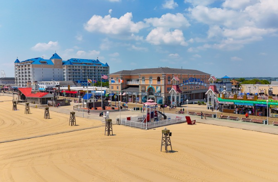 is-ocean-city-maryland-a-good-vacation-spot-Ocean-City-MD-Boardwalk-6a29be8569cf6.png The Ocean City Maryland Boardwalk looking north on a summer evening