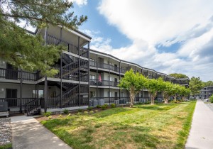 ourplaceatthebeach102f-1-exterior-street-side.jpg