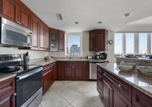 southbeach402-couch-and-tree-kitchen.jpg